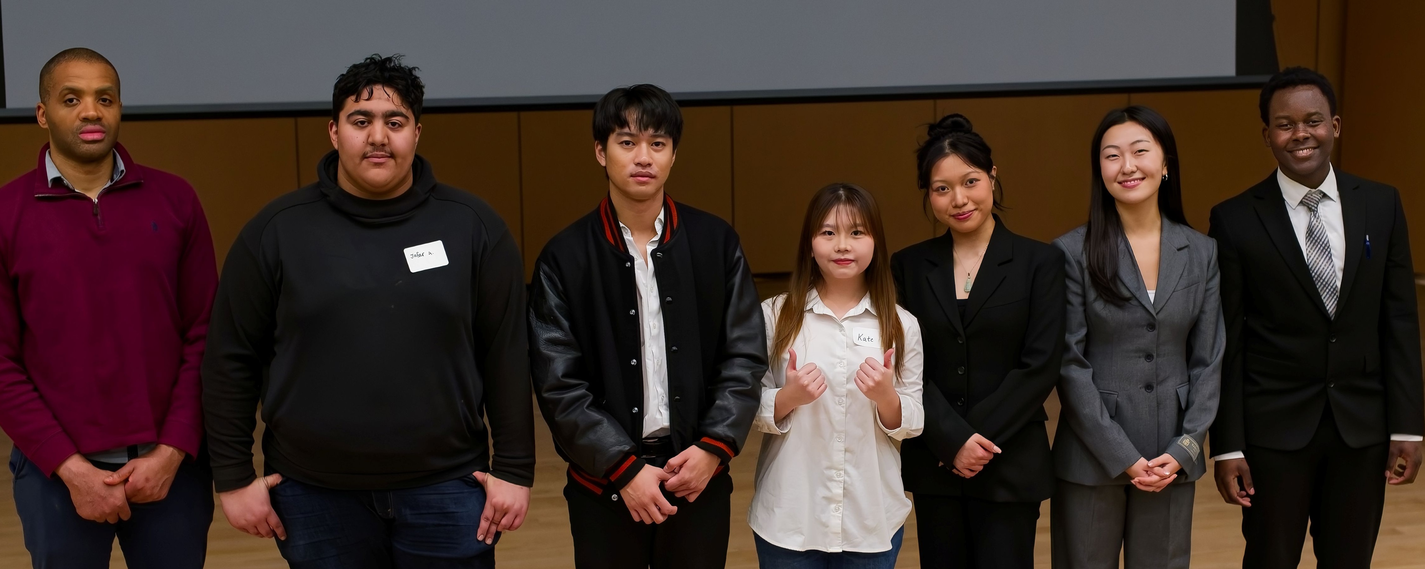Students from the winning teams of the case competition