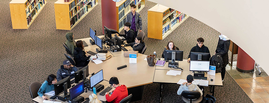  South Seattle College students study in the library 
