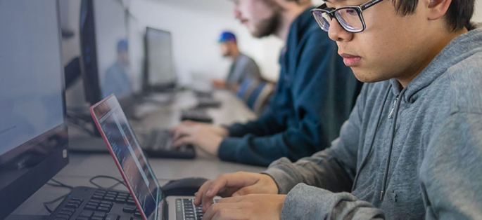 students at computers in a lab