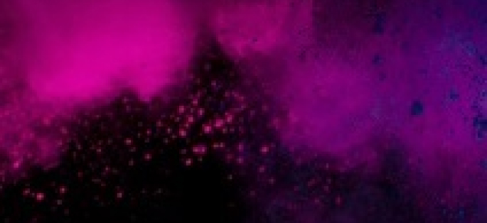 abstract decorative image of colored smoke in magenta, purple, and blue