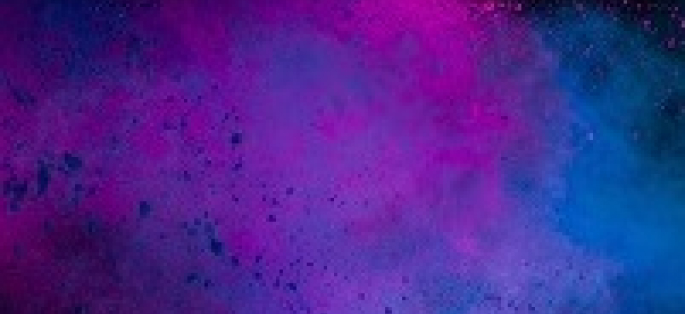 abstract decorative image of colored smoke in magenta, purple, and blue