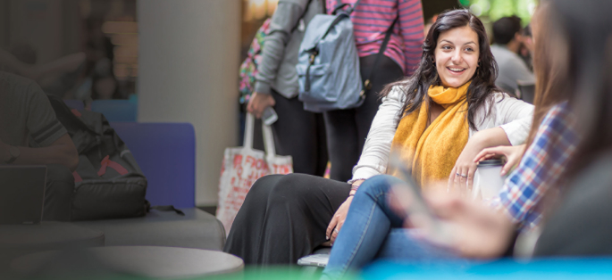 North Seattle open area, student smiling