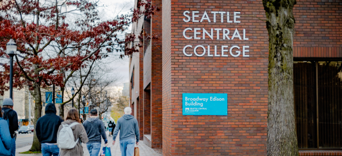 Seattle Central exterior on Broadway, folks walking on the street