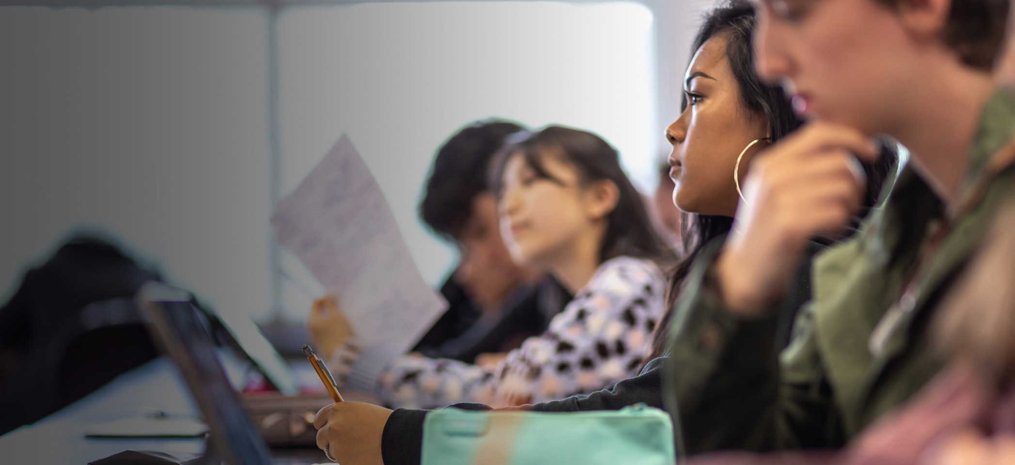 South Seattle College students in class taking notes