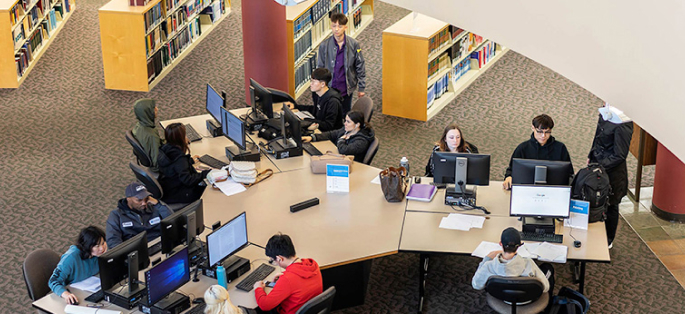 South Seattle College students study in the library birds eye view